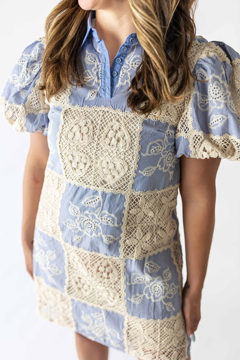 Blue and cream boho patchwork crochet dress with puff sleeves and floral lace details
