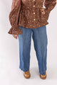 Weaving Color blue trouser wide leg pants styled with brown patterned blouse and tan shoes
