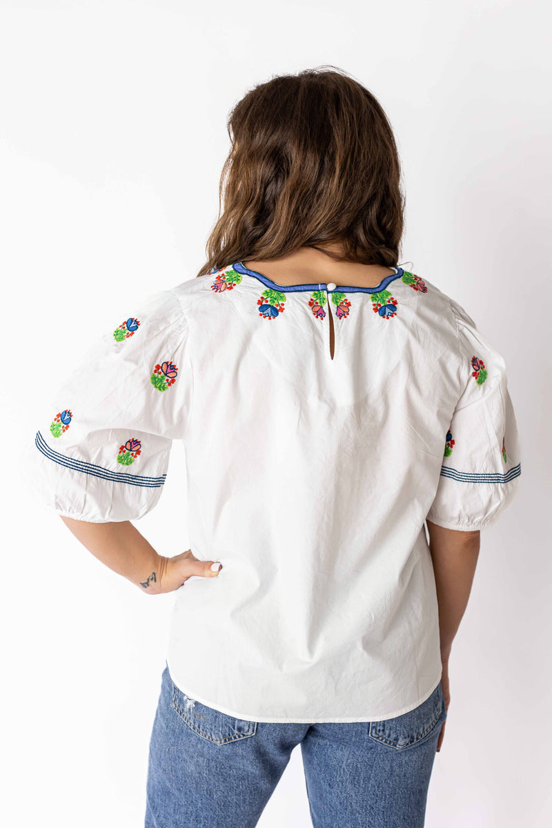 Weaving Color white embroidered peasant top with floral details on back and puff sleeves
