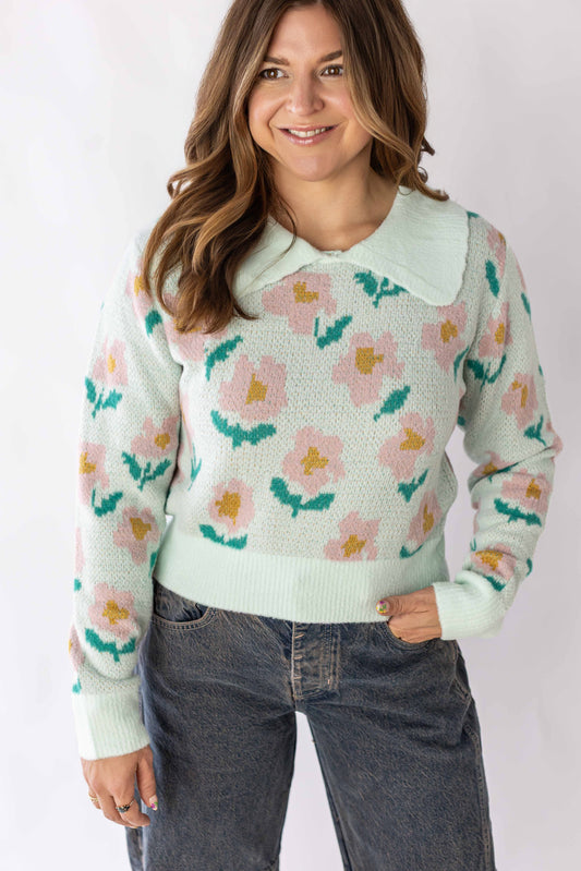 Weaving Color floral detail sweater in pastel green with pink and yellow flower patterns and a white collar