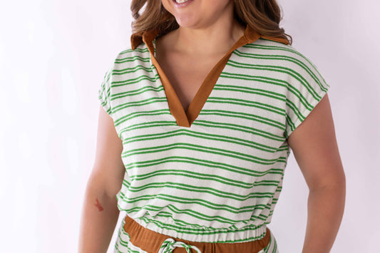 Woman wearing Weaving Color green stripe lounge set with green and white stripes and brown trim