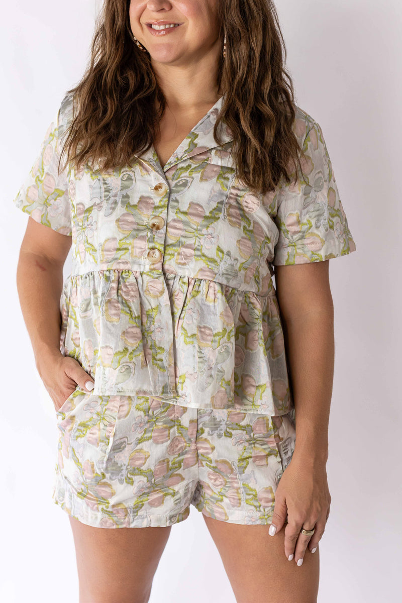 Weaving Color floral print peplum button up top with short sleeves and matching shorts