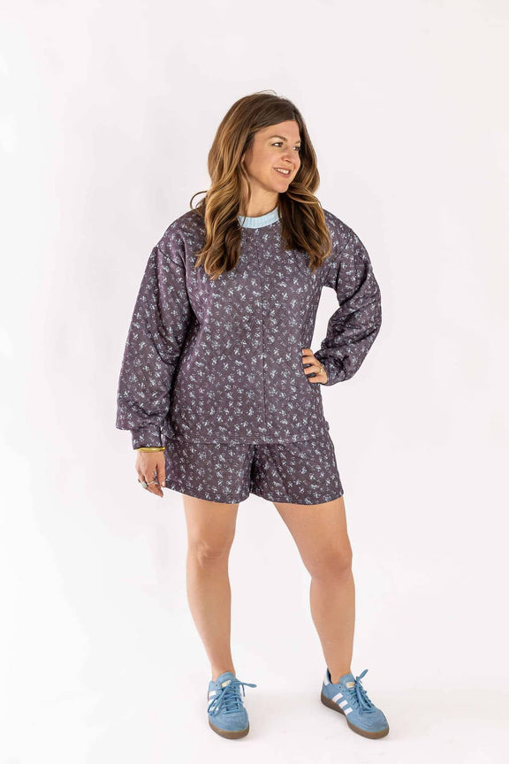 Weaving Color quilted set featuring a long sleeve top and matching shorts with a floral pattern
